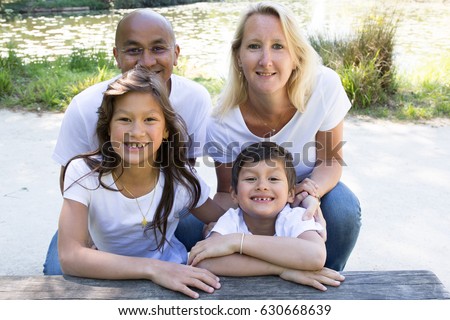 stock-photo-indian-and-european-family-w