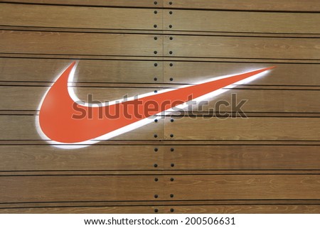 KUALA LUMPUR MALAYSIA - 25 May, 2014:NIKE logo. Nike is an American multinational corporation manufacturing footwear, apparel, equipment and accessories.