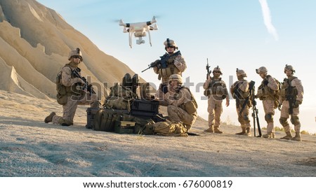 Soldiers are Using Drone for Scouting During Military Operation in the Desert.