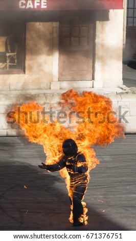 Actor burning man during stunt scene