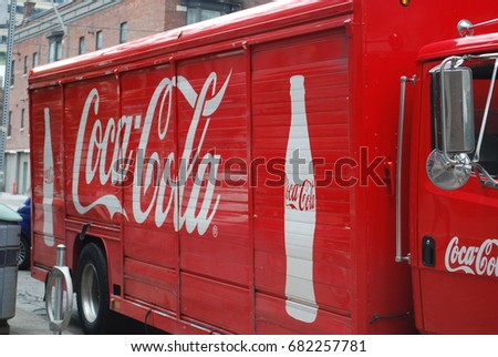 CocaCola Truck With Logos And Glass Bottle Image - Soft Drink / Pop - Vintage / Retro Red Vehicle - TORONTO, CANADA - July 2017