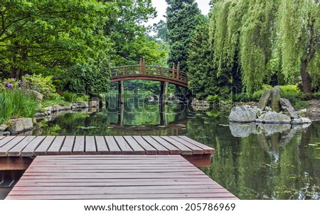 Red Japanese Garden Bridge japanese bridge stock images, royalty-free images & vectors Red Japanese Garden Bridge japanese bridge stock images, royalty-free images & vectors