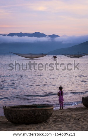 CIRCA APRIL 2010 - QUY NHON, VIETNAM - Fishing nets standing at rest off the shore, on 25 April 2010, at Quy Nhon, Vietnam.
