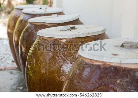 clay water storage pots at a house in vietnam