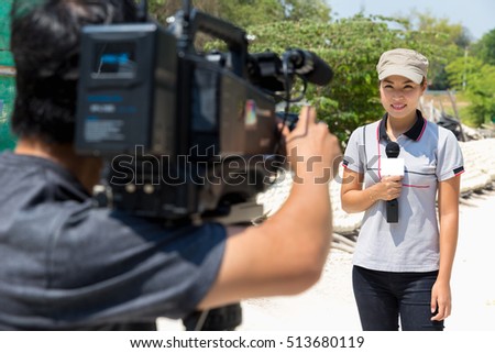 Female Journalist Outside Broadcasting in thailand.