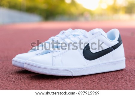NAKHON PRATHOM, THAILAND - AUGUST 12, 2017:Nike tennis shoe, classic white/black ,Nike, Inc. is an American multinational corporation that designs, develops, manufactures and sells tennis shoes.