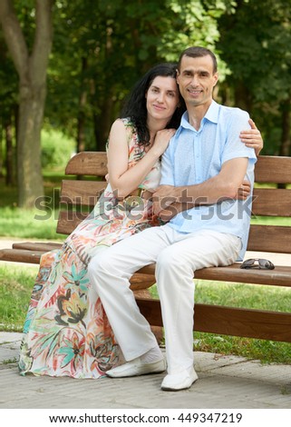 https://thumb7.shutterstock.com/display_pic_with_logo/183547/449347219/stock-photo-romantic-couple-sit-on-bench-in-city-park-summer-season-adult-happy-people-man-and-woman-449347219.jpg