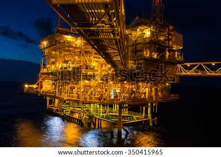 Offshore the night Industry oil and gas production petroleum pipeline.