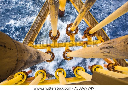 Offshore drill yellow oil and gas production petroleum pipeline.