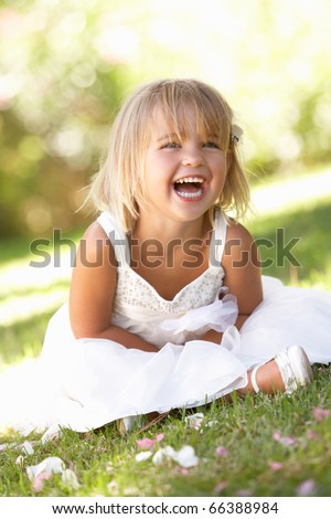 Young girl posing in park
