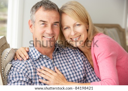 https://thumb7.shutterstock.com/display_pic_with_logo/187633/187633,1315062610,1/stock-photo-mid-age-couple-at-home-84198421.jpg