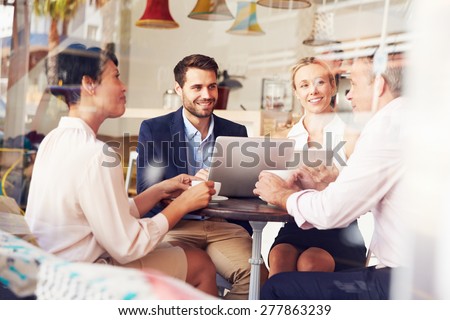 Business meeting in a cafe
