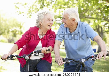 Senior couple riding bikes