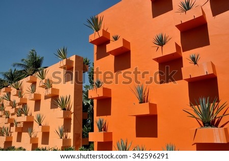  planter boxes holding Century plants at Nong Nooch Tropical Gardens