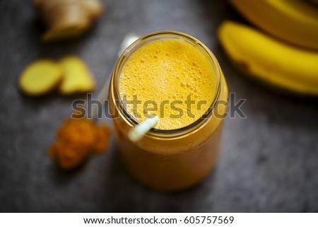 Pineapple, carrot and banana smoothie with ginger and turmeric