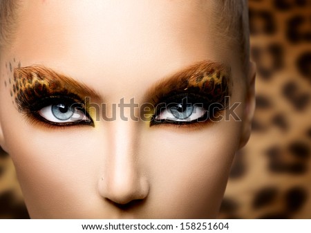 stock photo beauty fashion model girl with holiday leopard makeup golden wild cat eyes make up eyeshadow 158251604 - How it all started About Russian Women
