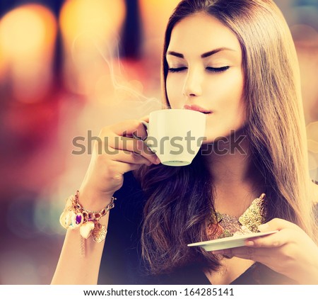 https://thumb7.shutterstock.com/display_pic_with_logo/195826/164285141/stock-photo-coffee-beautiful-girl-drinking-tea-or-coffee-in-cafe-beauty-model-woman-with-the-cup-of-hot-164285141.jpg