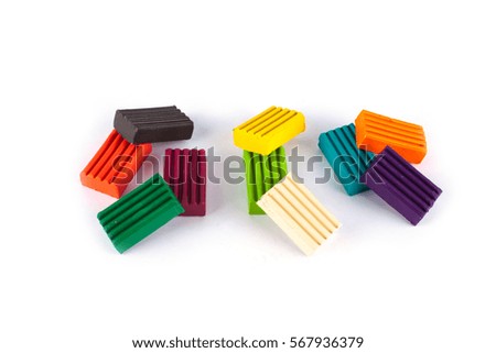 Photo children's colored plasticine isolated on white background. Materials for creativity.