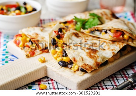 black beans tomato corn quesadilla. the toning. selective focus