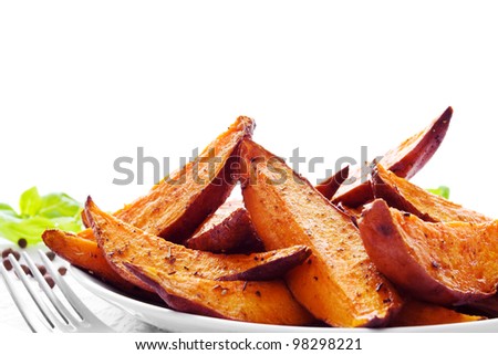 Portion of fresh baked sweet potato wedges
