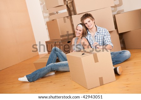 https://thumb7.shutterstock.com/display_pic_with_logo/206023/206023,1260972470,1/stock-photo-moving-house-happy-couple-celebrating-with-glass-of-champagne-new-home-42943051.jpg