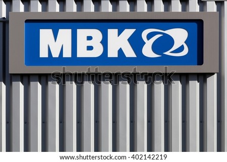 Villefranche, France - March 27, 2016: MBK logo on a wall. MBK a subsidiary of Yamaha Motor Company, is a french scooter manufacturer, based in Rouvroy, France