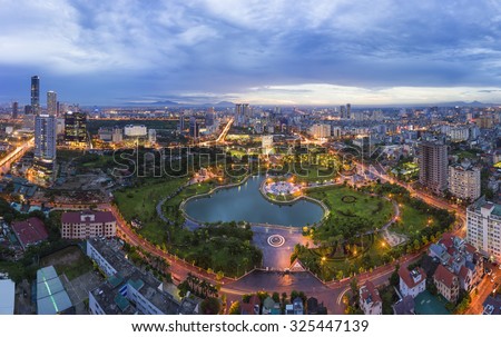 Hanoi skyline cityscape at twilight period. Aerial view of Cau Giay park, west of Hanoi
