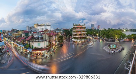 Hanoi, Vietnam - Aug 28, 2015: Aerial panorama view of Hanoi cityscape at twilight at intersection locating next to Hoan Kiem lake, center of Hanoi.