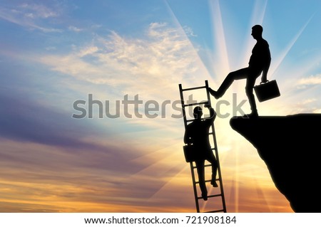 Silhouette of a businessman climbs up the stairs and another businessman pushes this ladder. The concept of inequality and injustice