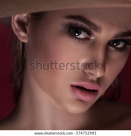 Beauty portrait of attractive young woman with beautiful eyes.
