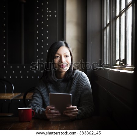https://thumb7.shutterstock.com/display_pic_with_logo/2117717/383862145/stock-photo-asian-lady-coffee-cafe-tablet-concept-383862145.jpg