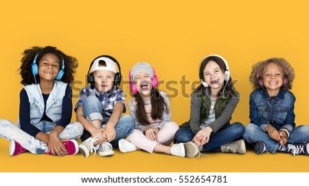 group of children studio smiling wearing headphones and winter clothes concept - Free Children Images group of children studio smiling wearing headphones and winter clothes concept - Free Children Images