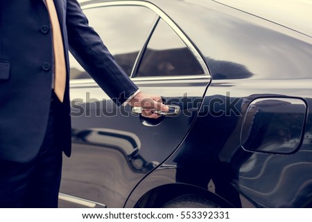 [fb] les angélus // jola&monsiame Stock-photo-businessman-handle-limousine-door-car-553392331