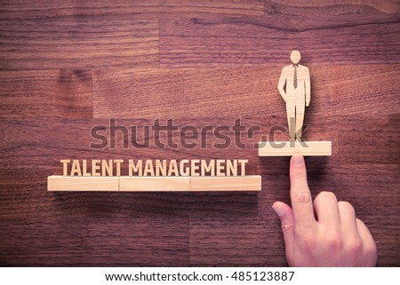 Talent management concept. Human resources recruiter helps employee with his personal development.
