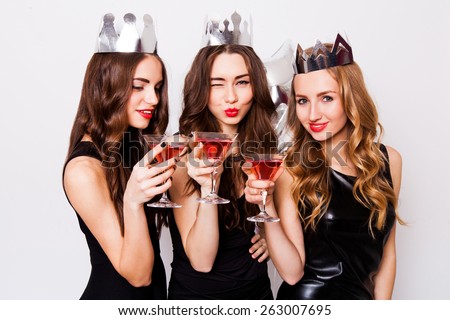 https://thumb7.shutterstock.com/display_pic_with_logo/2196125/263007695/stock-photo-three-beautiful-elegant-women-celebrate-hen-party-and-drinking-cocktails-best-friends-wearing-263007695.jpg