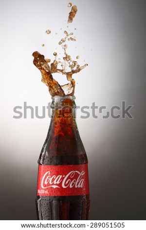KUALA LUMPUR, MALAYSIA -June 6TH, 2015. A bottle of Coca Cola soft drinks. Coca Cola drinks are produced and manufactured by The Coca-Cola Company, an American multinational beverage corporation