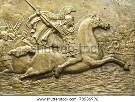 Bronze relief depicting Alexander the Great and his army in battle.