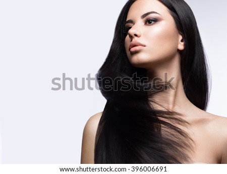 https://thumb7.shutterstock.com/display_pic_with_logo/2256221/396006691/stock-photo-beautiful-brunette-girl-in-move-with-a-perfectly-smooth-hair-and-classic-make-up-beauty-face-396006691.jpg
