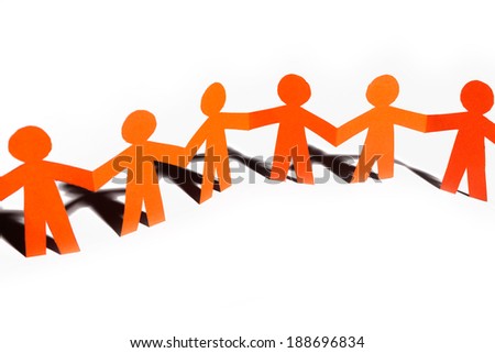 Group Of Paper Doll Holding Hands Teamwork Concept Craft Orange Dolls On White Group Of Paper Doll Holding Hands Teamwork Concept Craft Orange Dolls On White