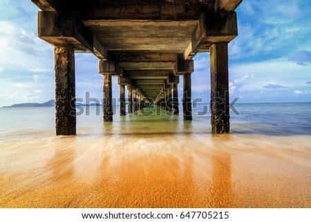 stock-photo-under-bridge-on-beach-into-c