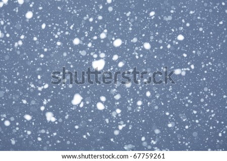 abstract texture with snow falling