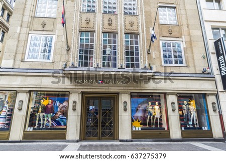 Dusseldorf, Germany - April 16, 2017: Tommy Hilfiger store located in a classical building in Dusseldorf, Germany