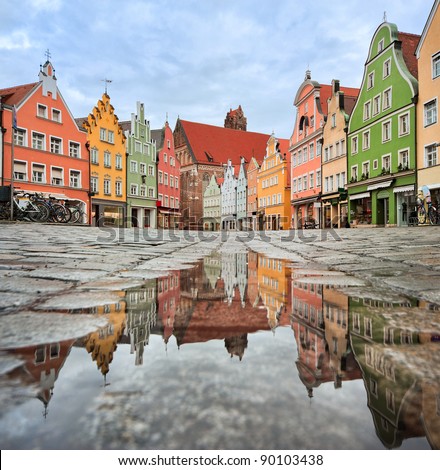 Picturesque Old Gothic Houses  Reflecting Puddle Stock 