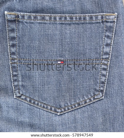 NEW YORK, USA - CIRCA JANUARY 2017: Tommy Hilfiger blue jeans detail of a back pocket with logo