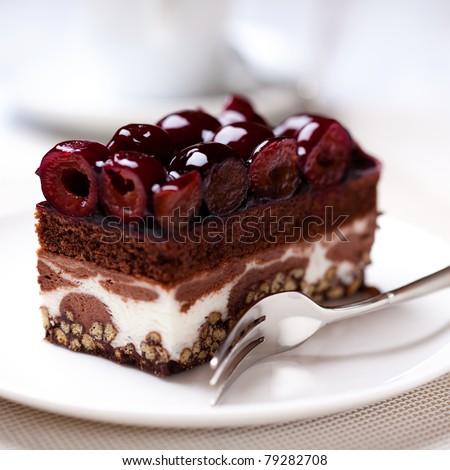 Chocolate cake with sour cherries - stock photo