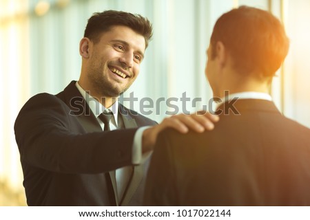 [Image: stock-photo-the-smile-businessmen-pat-on...022144.jpg]