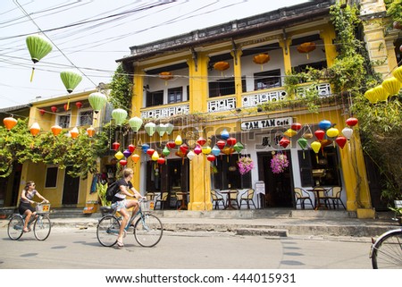 Hoian, Vietnam - Apr 2, 2016: Street view with old houses in Hoi An ancient town, UNESCO world heritage. Hoi An is one of the most popular destinations in Vietnam.