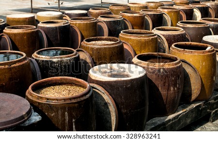 Making soy sauce in carrier (lu) in Dong Thap province, Vietnam