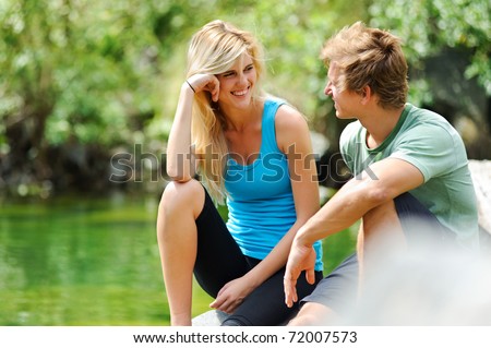 https://thumb7.shutterstock.com/display_pic_with_logo/239779/239779,1298742219,1/stock-photo-candid-couple-having-fun-outdoors-carefree-summer-romance-concept-72007573.jpg