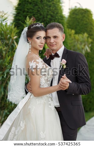 https://thumb7.shutterstock.com/display_pic_with_logo/2457938/537425365/stock-photo-beautiful-wedding-couple-bride-and-groom-at-wedding-day-outdoors-in-park-happy-marriage-couple-537425365.jpg